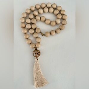 Elegant Beige Beaded Necklace with Tassel